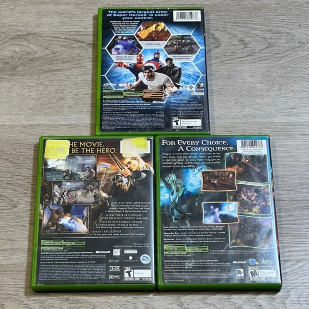 Microsoft Xbox Video Game Lot 3 Games Marvel Ultimate Alliance Fable LOTR Return